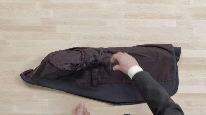 how to fold a suit in a carry on